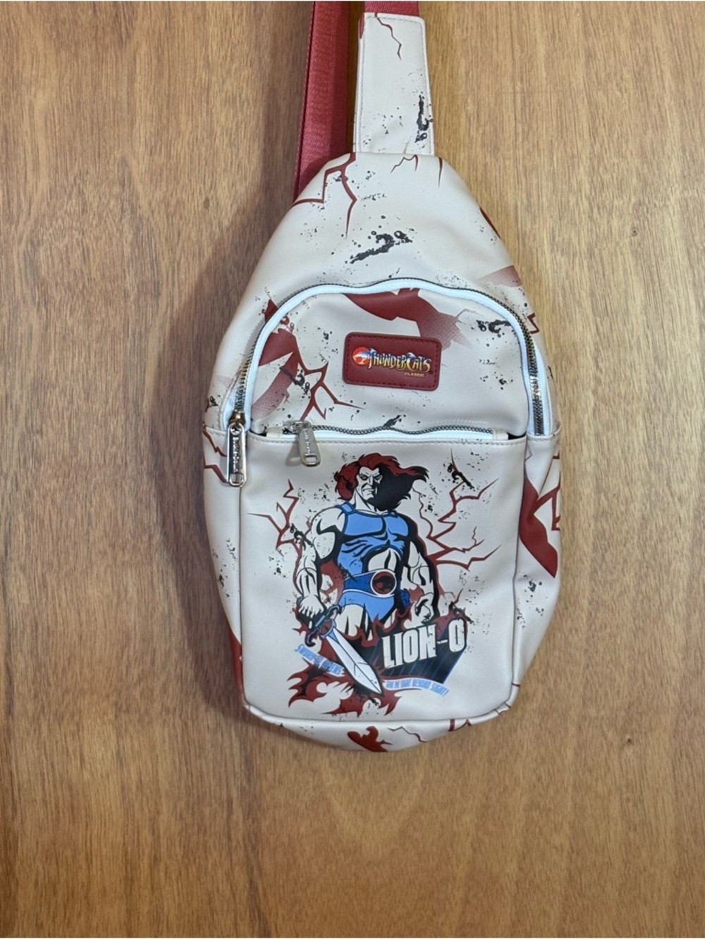 Buckle-Down Cream & Red Thundercats Classic LION-O Graphic Sling Bag